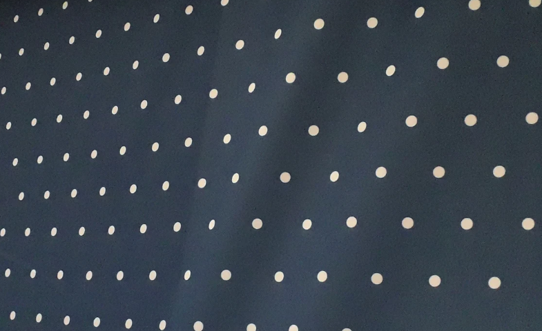 pink polka dot fabric navy backgorund